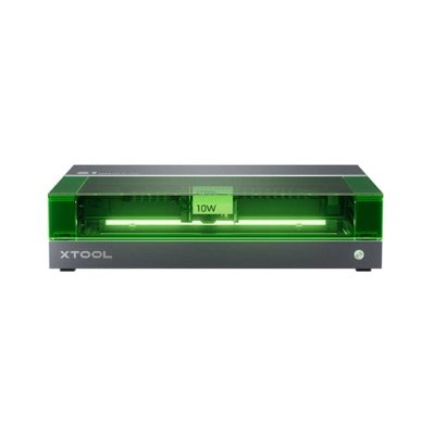 xTool S1 vu de face, capot vert allumé, équipé ici du module laser 10 W